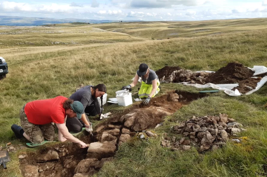 Jess, Andrew and Katie excavating Trench 17