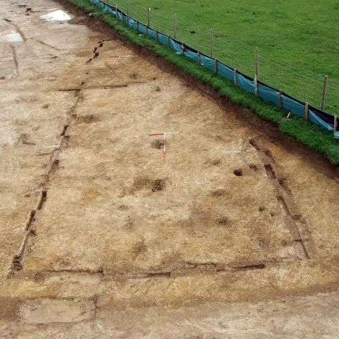 View of excavated foundations of a rectangular Anglo-Saxon House.