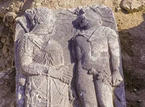 Image of a stele with a relief of the Hellenistic King Antiochos and the god Apollo 