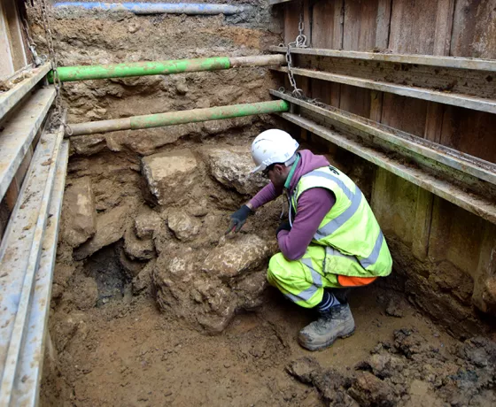 An archaeologist reveals the previously unknown remains of a buried stone-built medieval bridge abutment below Old Abingdon Road