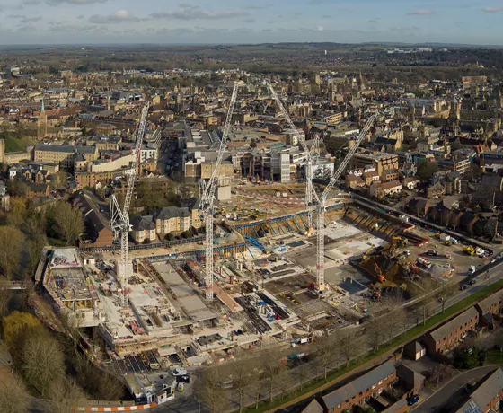 General drone view of the site from Oxpens Meadow looking NW over Westgate, Oxford and beyond
