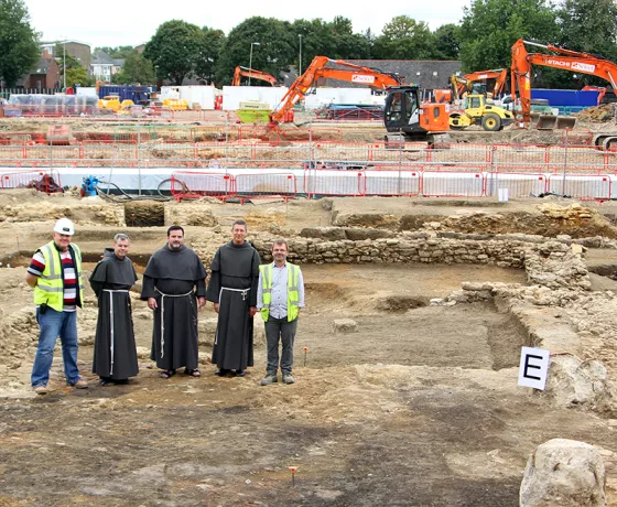 Representatives from the modern community of Greyfriars in Oxford visit the site to view the remains of their founding site