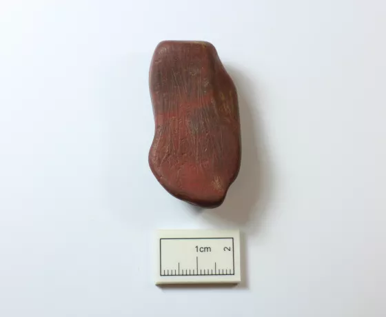 Ochre fragment with use striations on it 