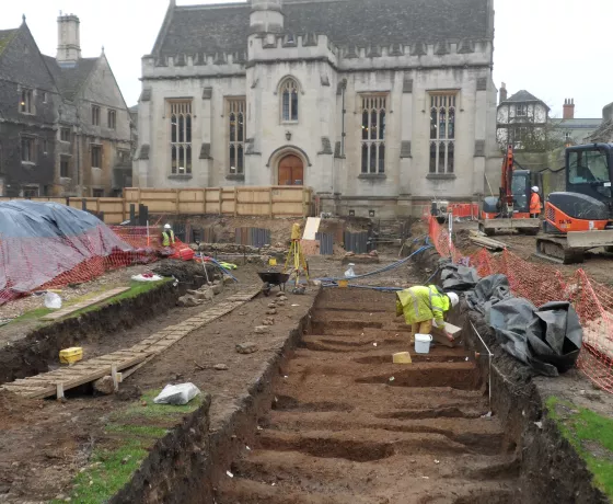 General view of the medieval cemetery in Longwall Quad, Magdalen College under excavation. View to south with Magdalen College library in background 